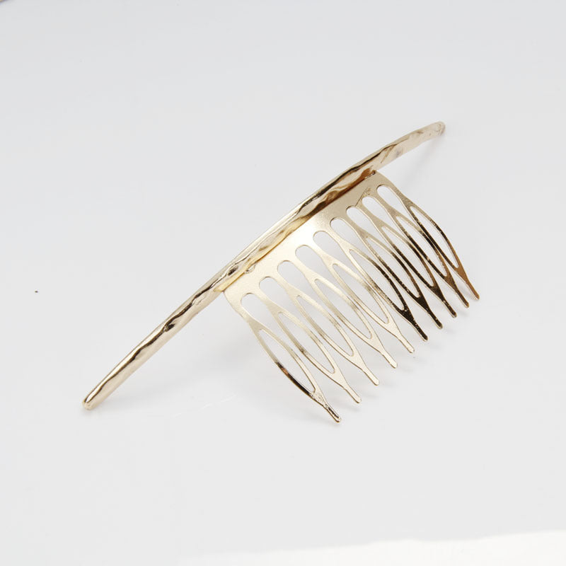 Curved hair comb